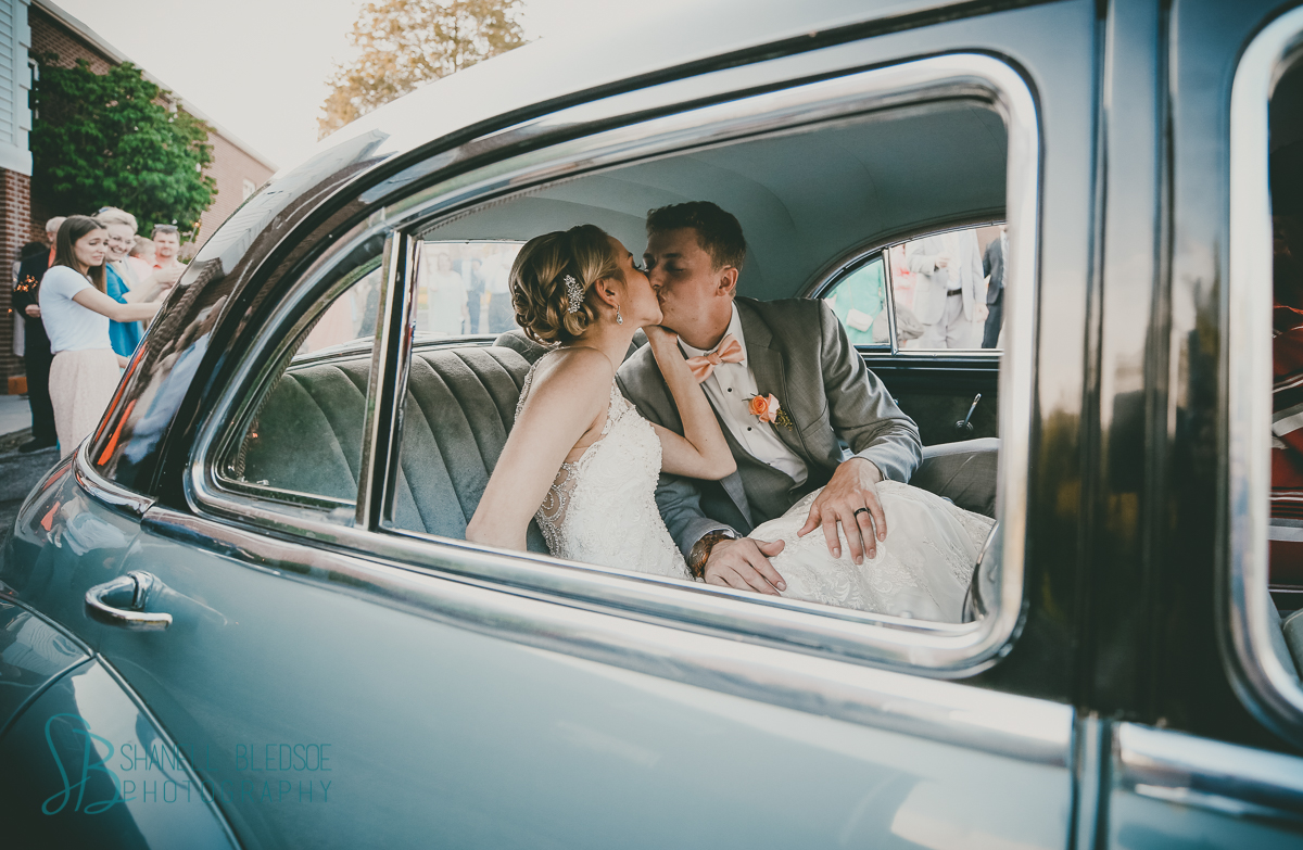 vintage buick eight getaway wedding reception car