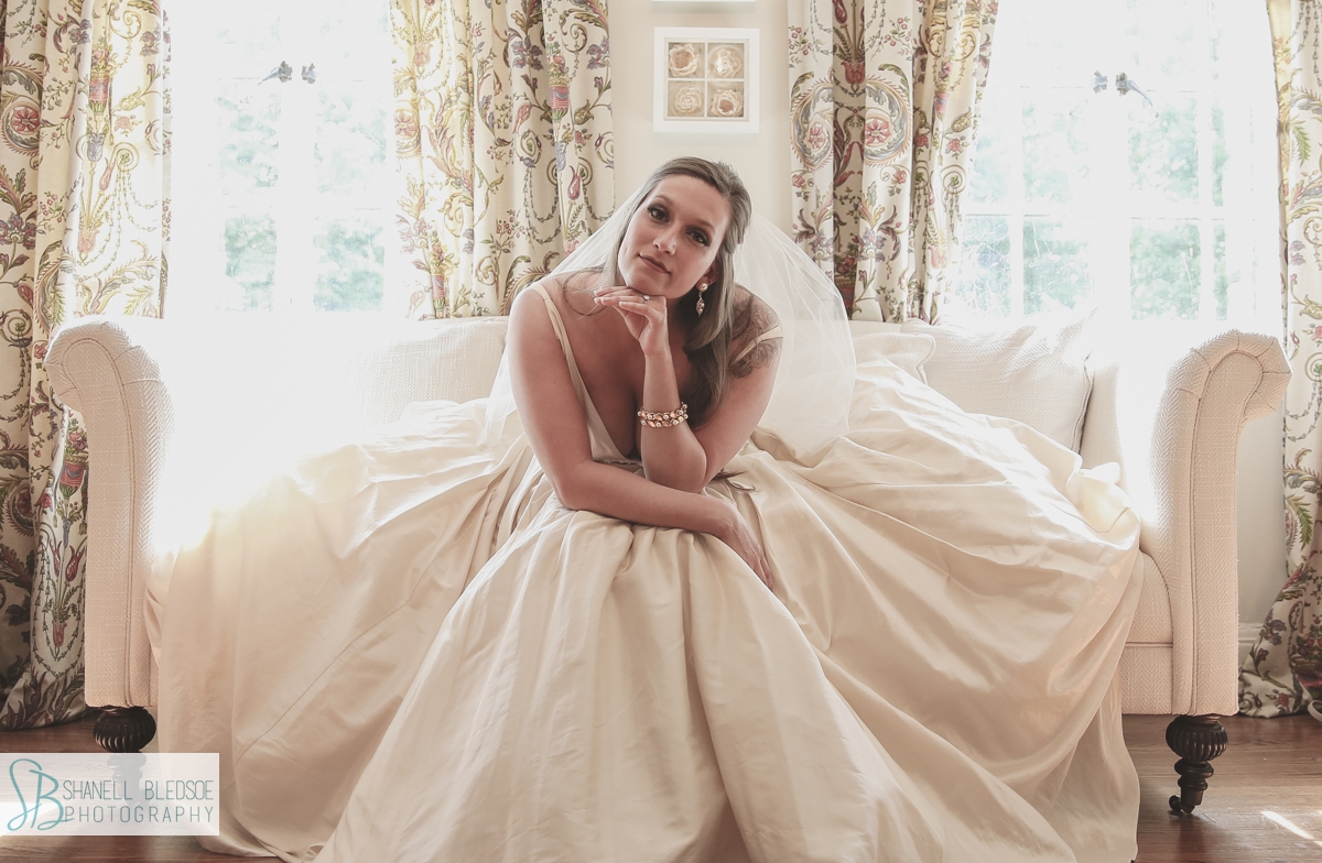 bride on sofa before wedding at grandview  chattanooga lookout mountain
