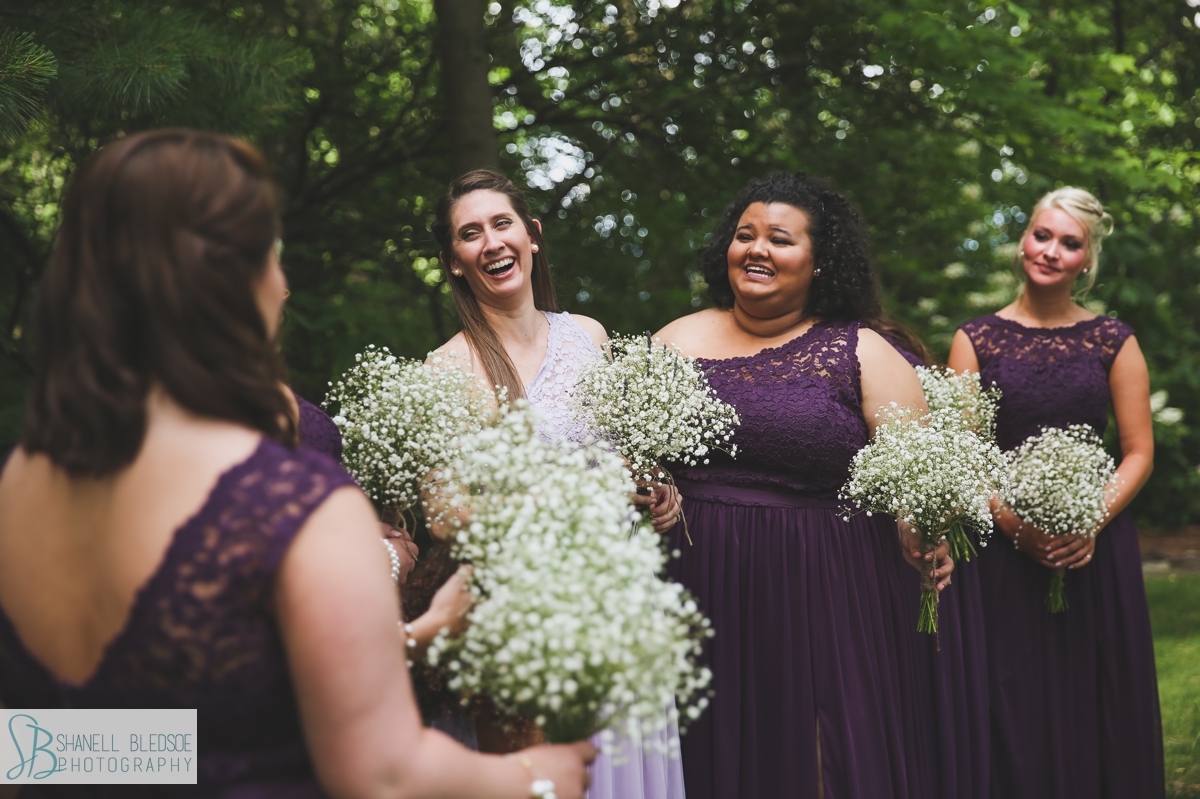 bride with bridesmaids in plum purple at Grandview Chattanooga