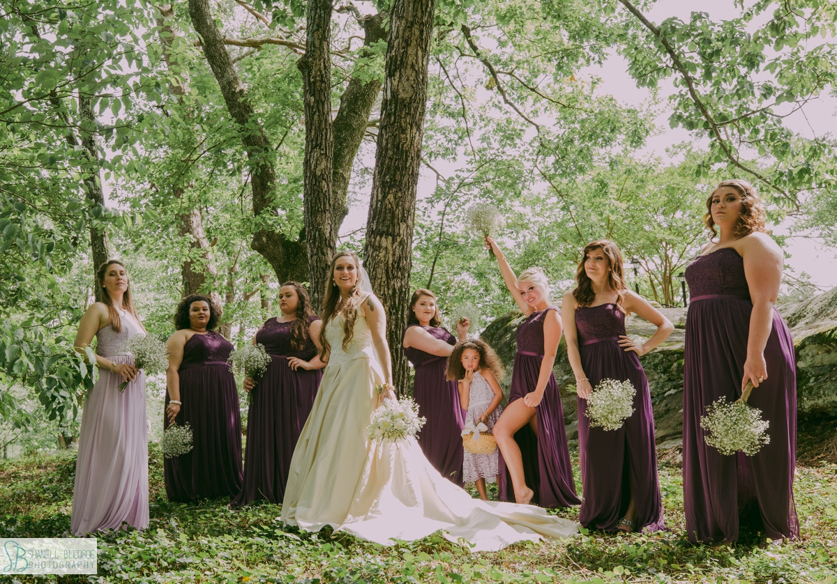 bride with bridesmaids in plum purple at Grandview Chattanooga