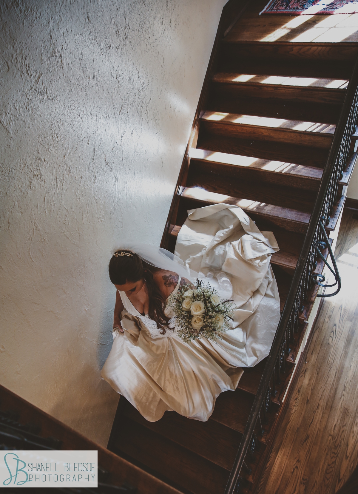 bride descending staircase at Grandview wedding in Chattanooga Lookout Mountain
