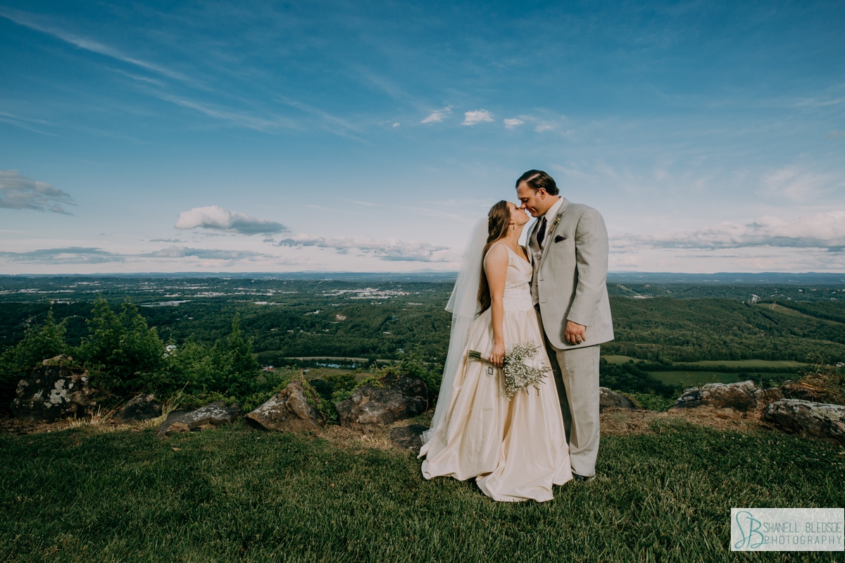 bride and groom overlooking Chattanooga Valley at Rock City portrait 