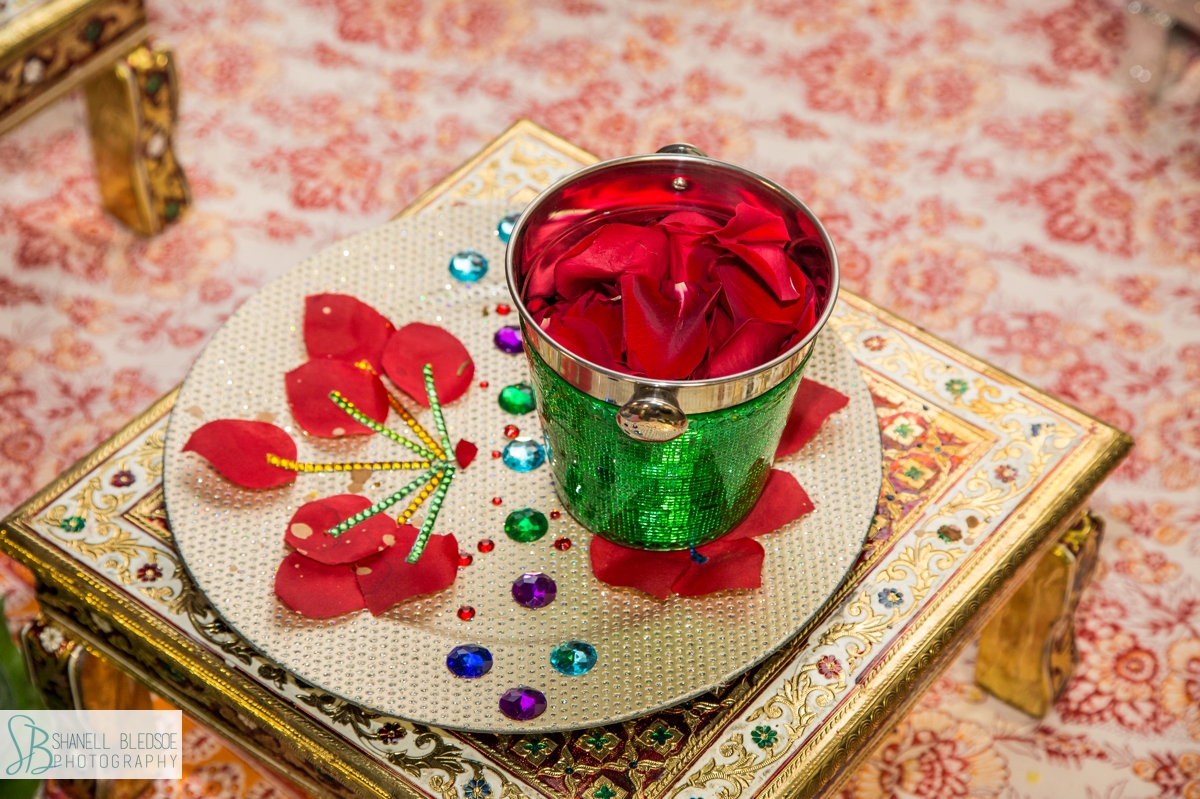 rose petals on plate at Haldi