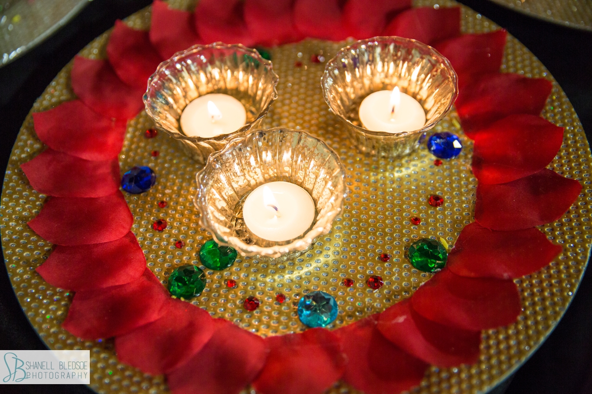candles on plate at haldi decoration