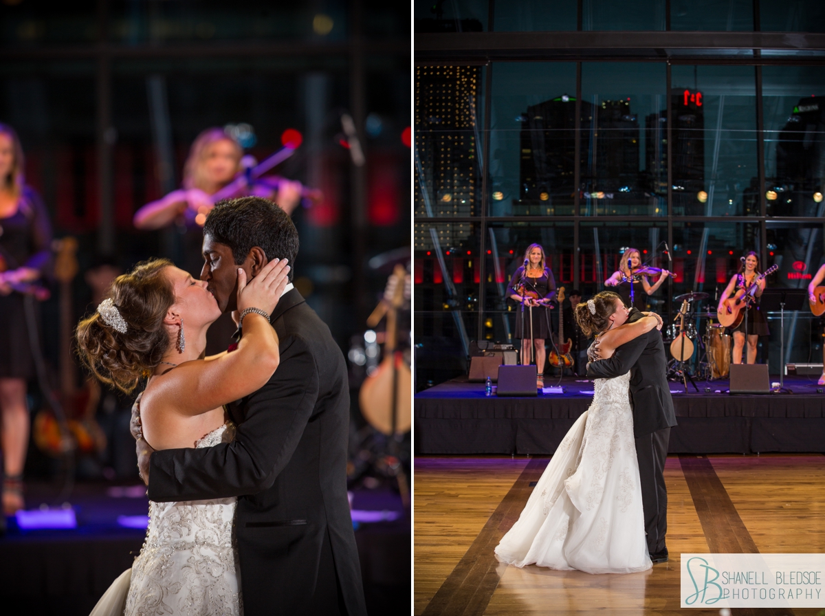 first dance groom dips his bride at country music hall of fame wedding reception