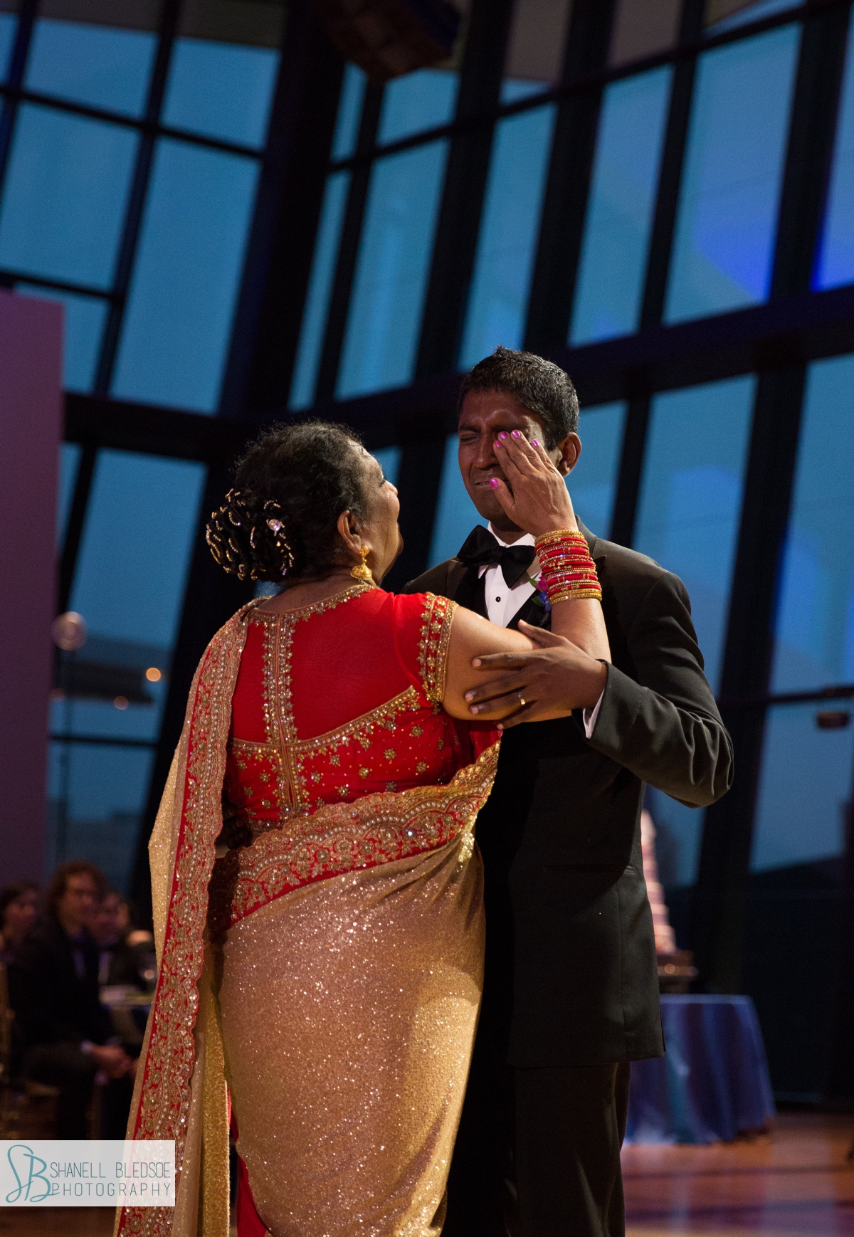 Indian mother wipes away son's groom tears at country music hall of fame