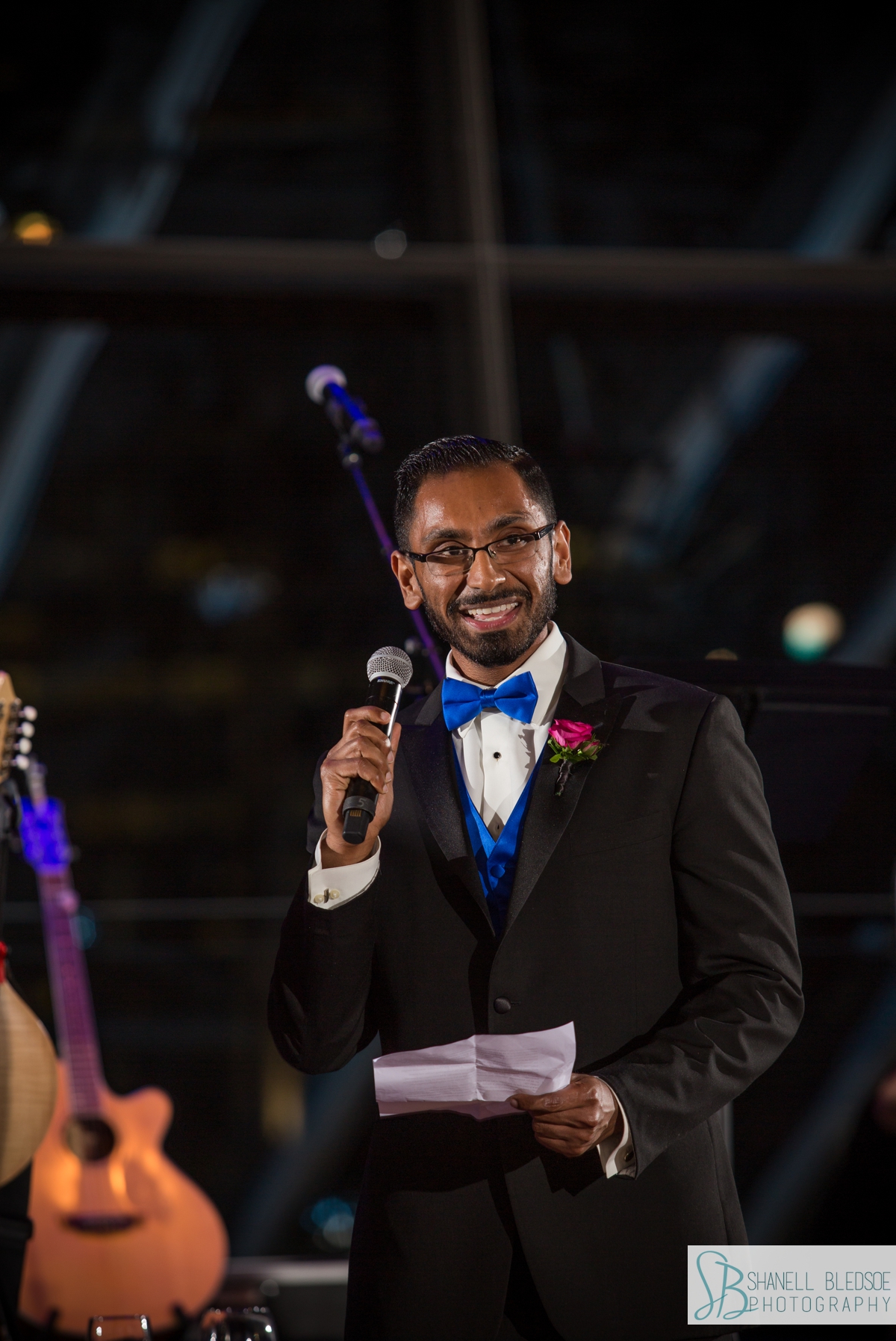 brother toasts bride and groom at country music hall of fame Indian wedding reception