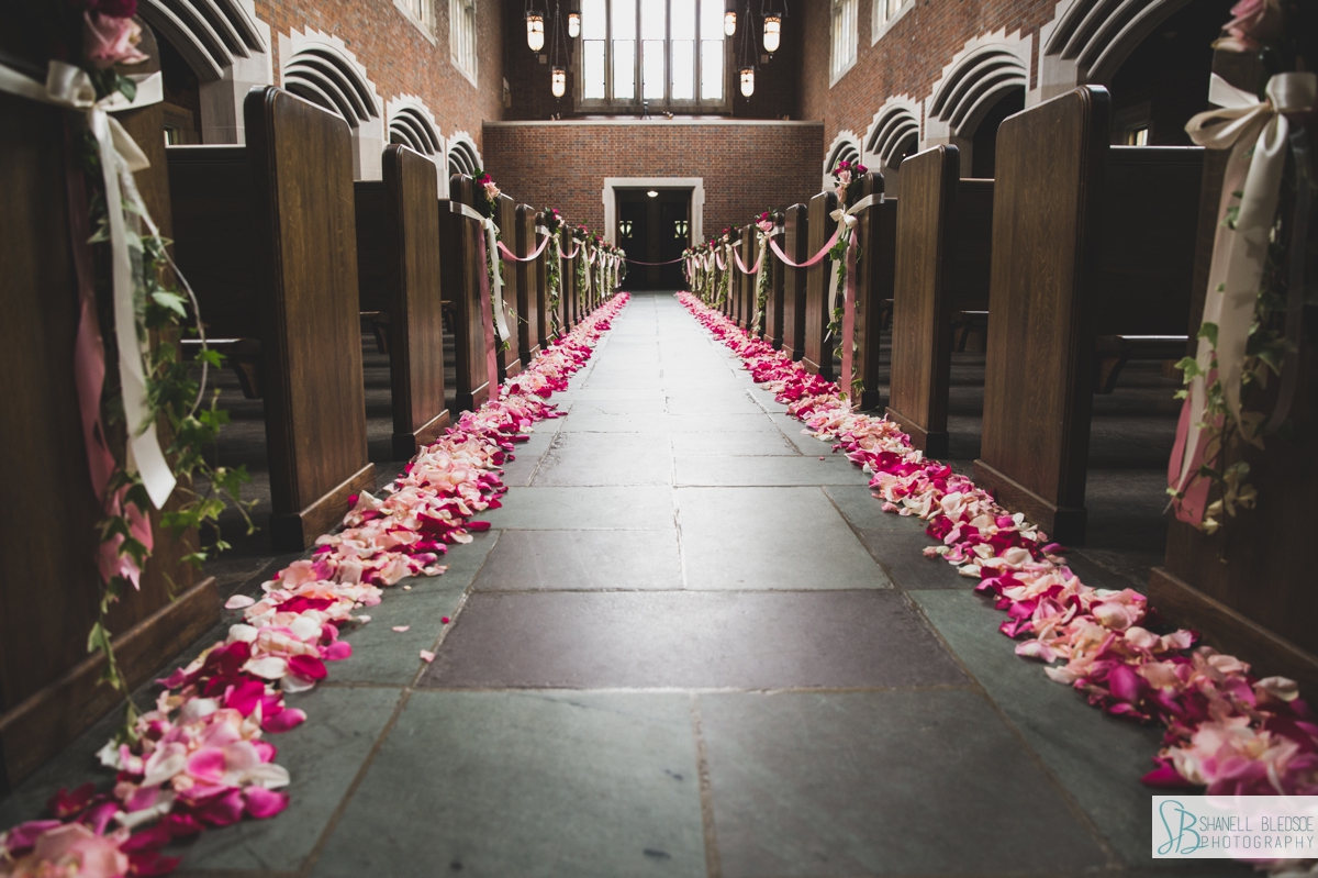 pink, hot pink, fuchsia petals lining aisle at Wightman Chapel