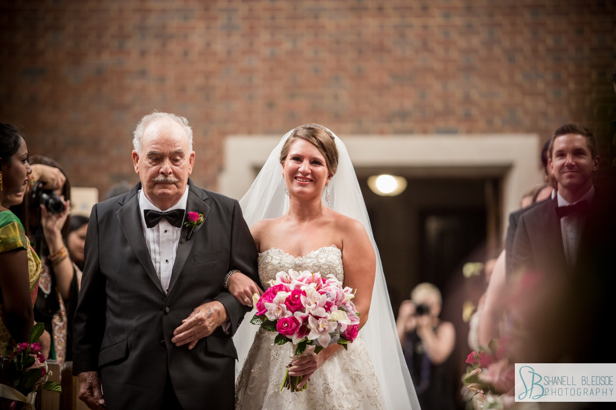 crying American bride walking down the aisle at Wightman Chapel nashville wedding photographer