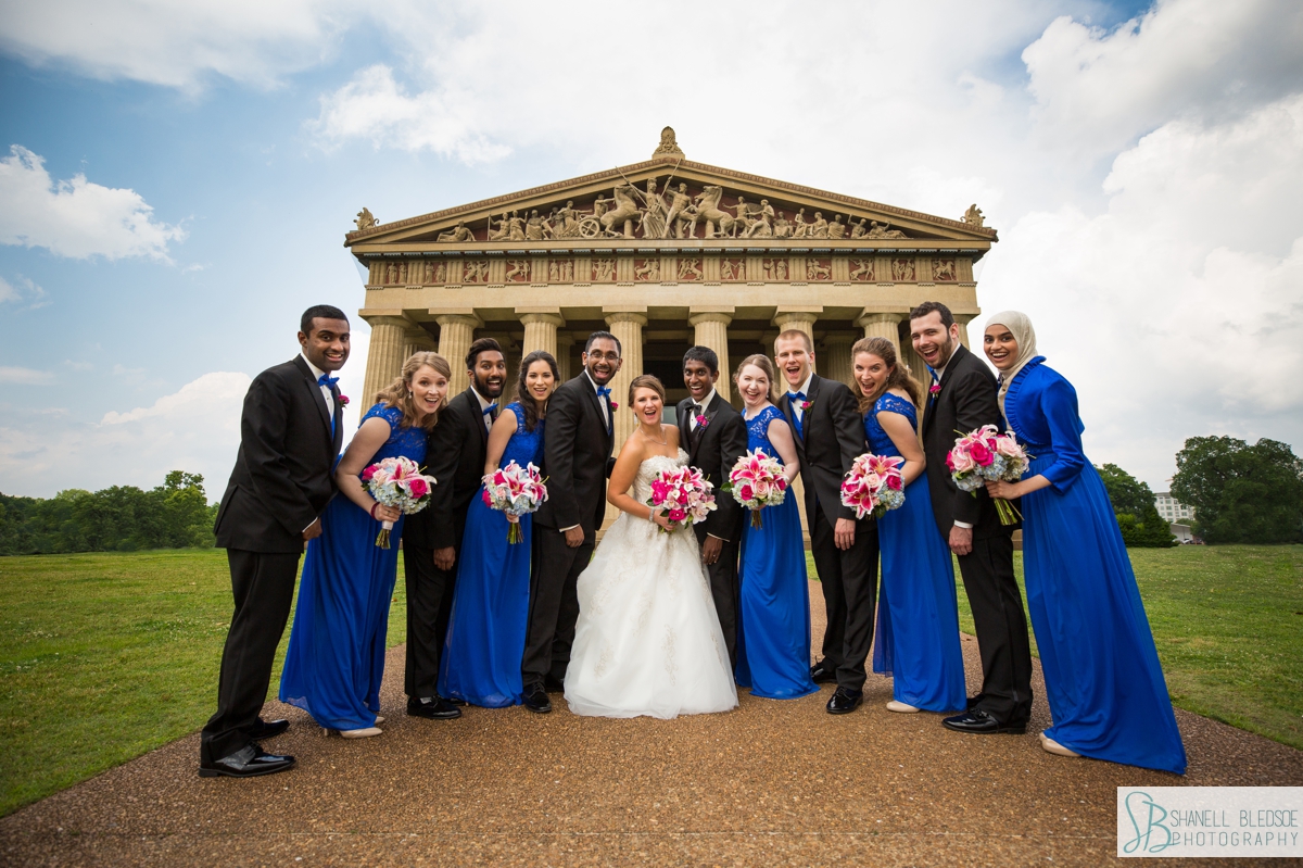 royal blue wedding party in front of the Parthenon in Nashville