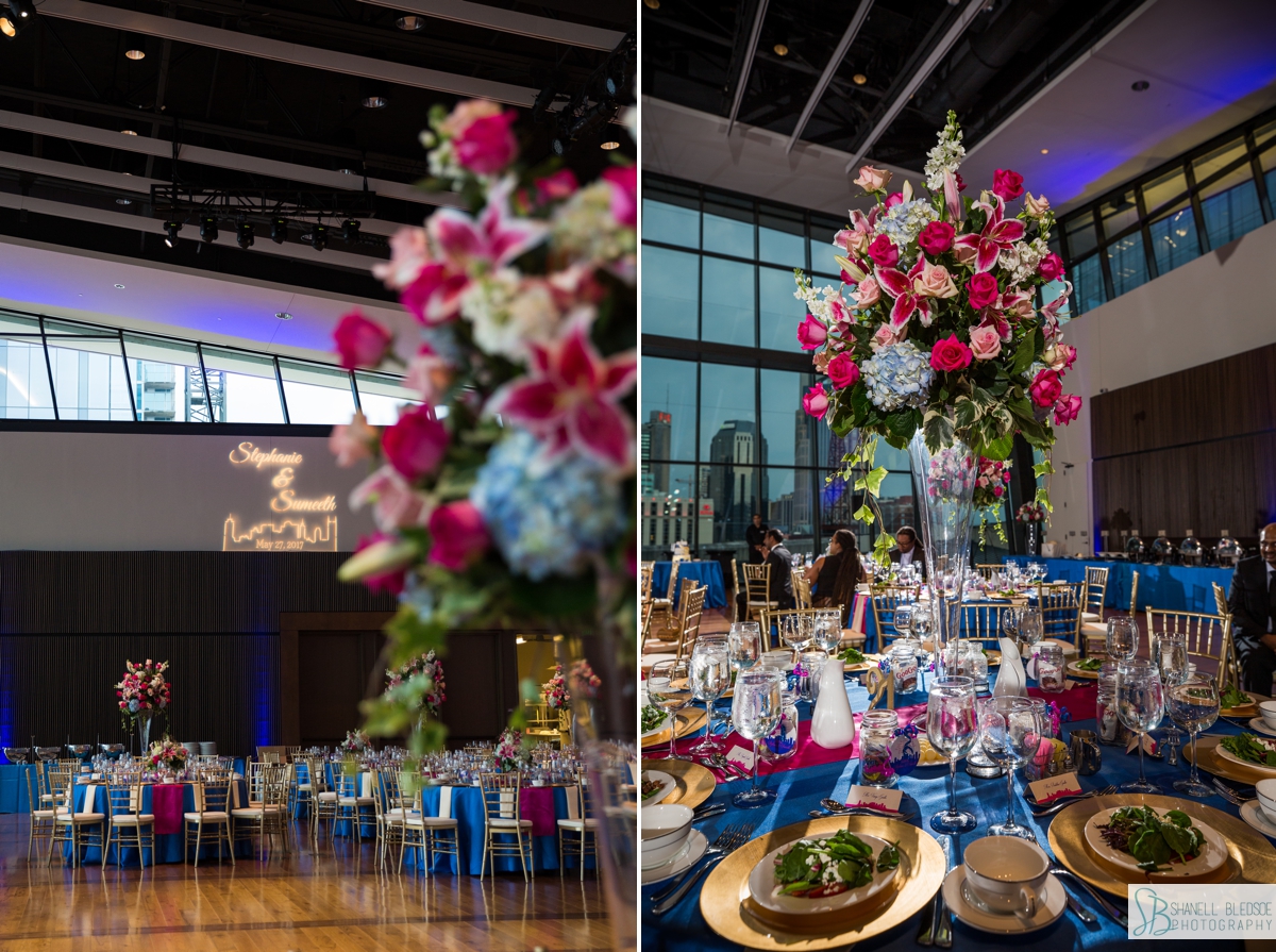 royal blue linens gold chargers and pink stargazer lily centerpieces wedding reception photo of Event Hall at Country Music Hall of Fame