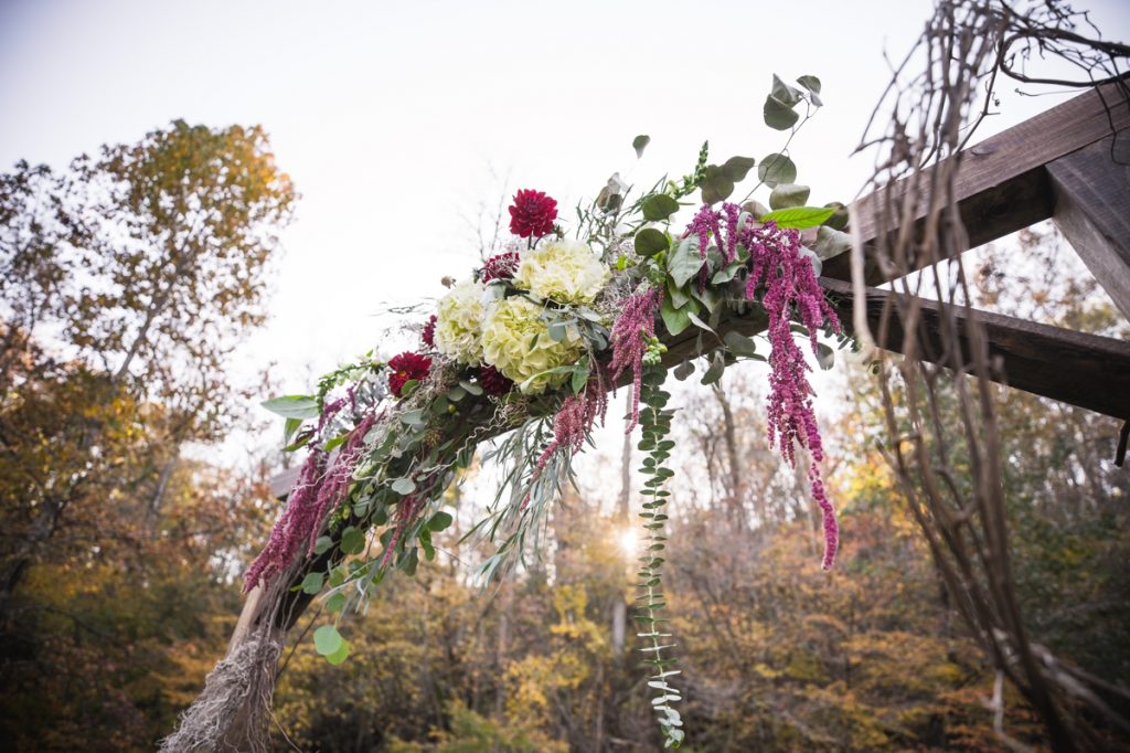 fall wedding arbor flowers