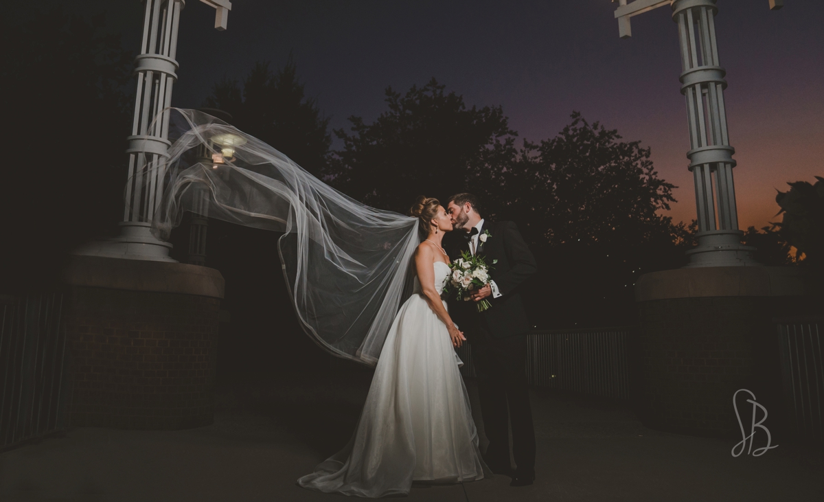 Sowa Hookman wedding photos at World's Fair Park in Knoxville, TN flying veil