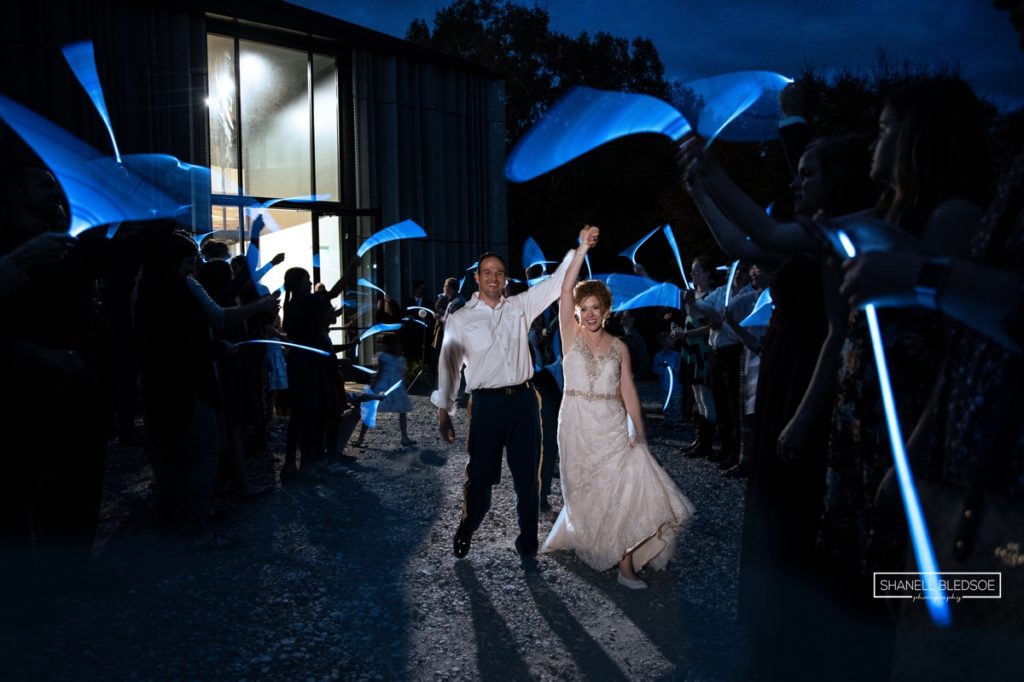 Blue glow sticks wedding exit at Dogwood Center