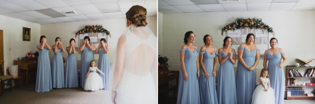 First look with bridesmaids in dusty blue in Knoxville