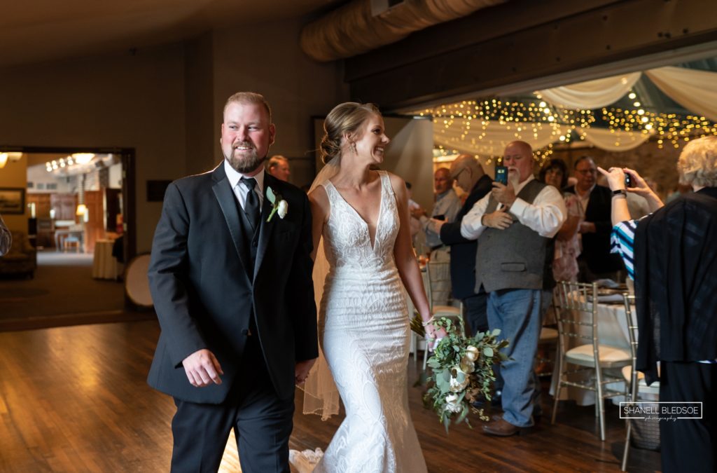 Bride and groom entering reception at The Foundry in Knoxville