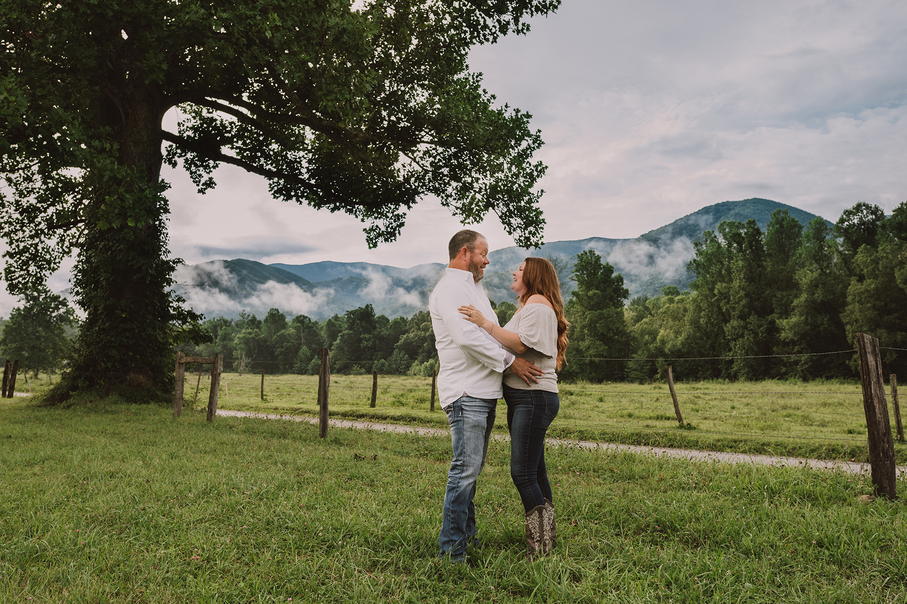 Couple having engagement photos in Cades Cove